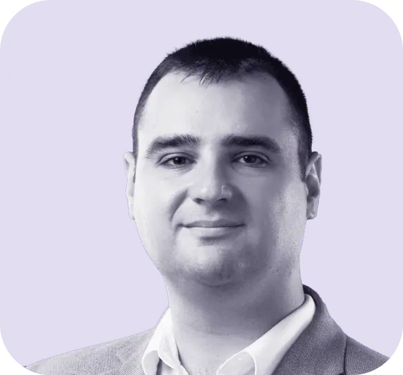 Monochrome photo of a person in a light-colored blazer and shirt, set against a purple background with rounded corners, evokes the sleek design found on Clio websites. - Clio Websites | Top Canadian Web Design Company
